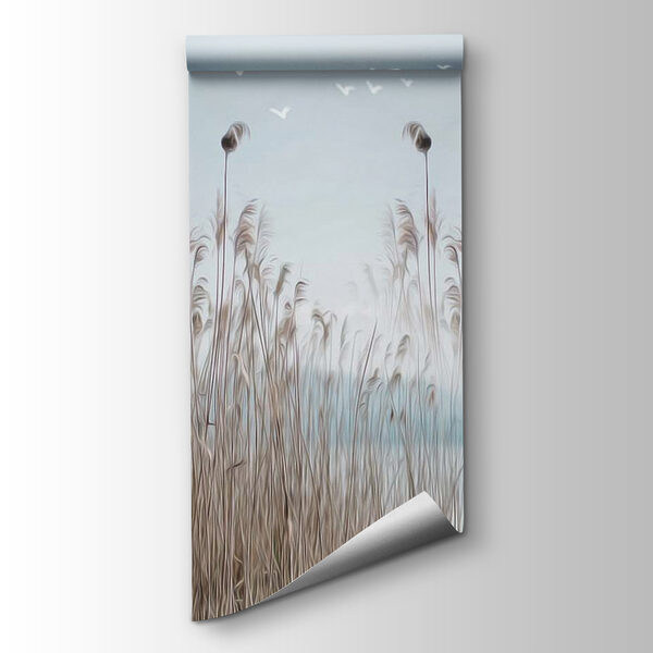 Group of tall grass with birds flying in the sky