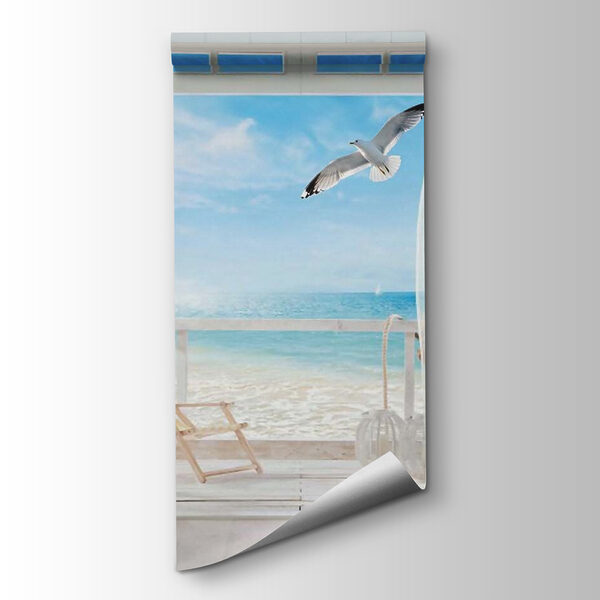 View of a beach from a room with a bird flying over it View of a beach from a room with a bird flying over it