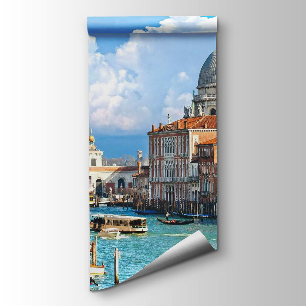 Water way with boats and buildings in the background