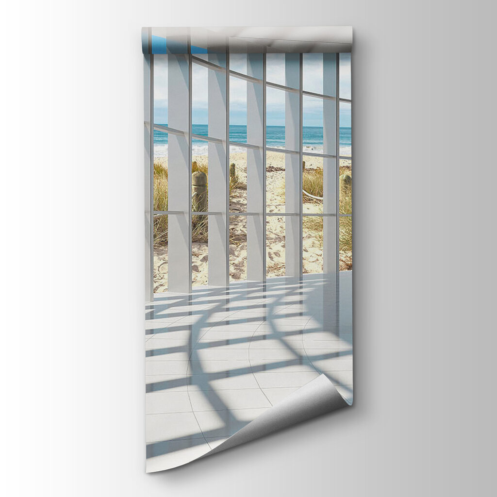 Large room with windows and a beach view