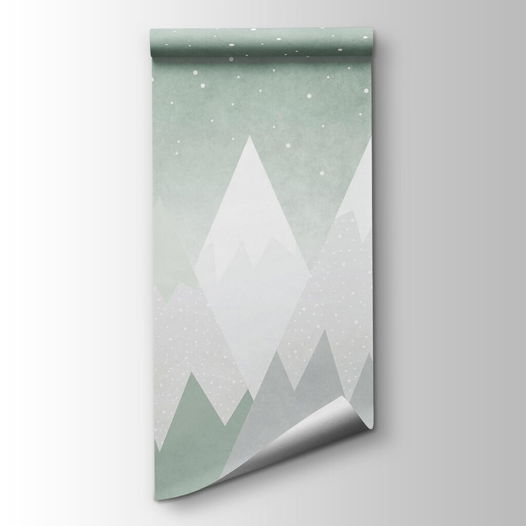 Mountain range with snow falling