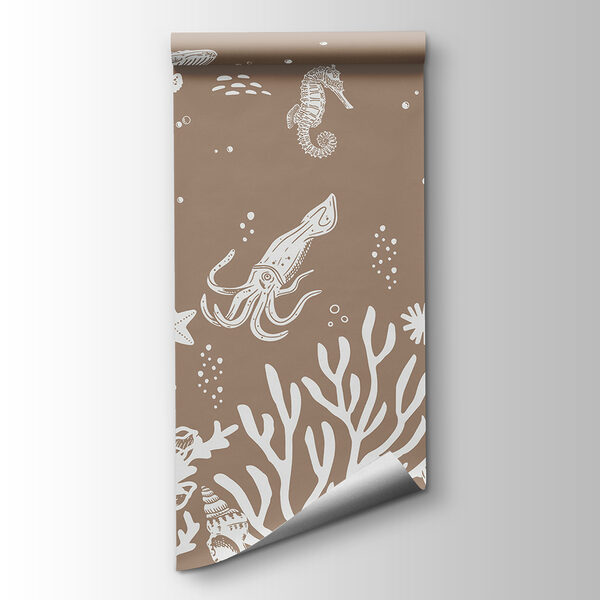 A white line drawing of sea animals