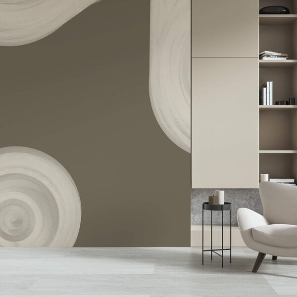 White swirly object on a brown background