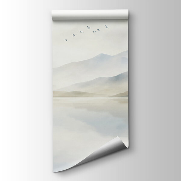Sailboat on a lake with mountains in the background